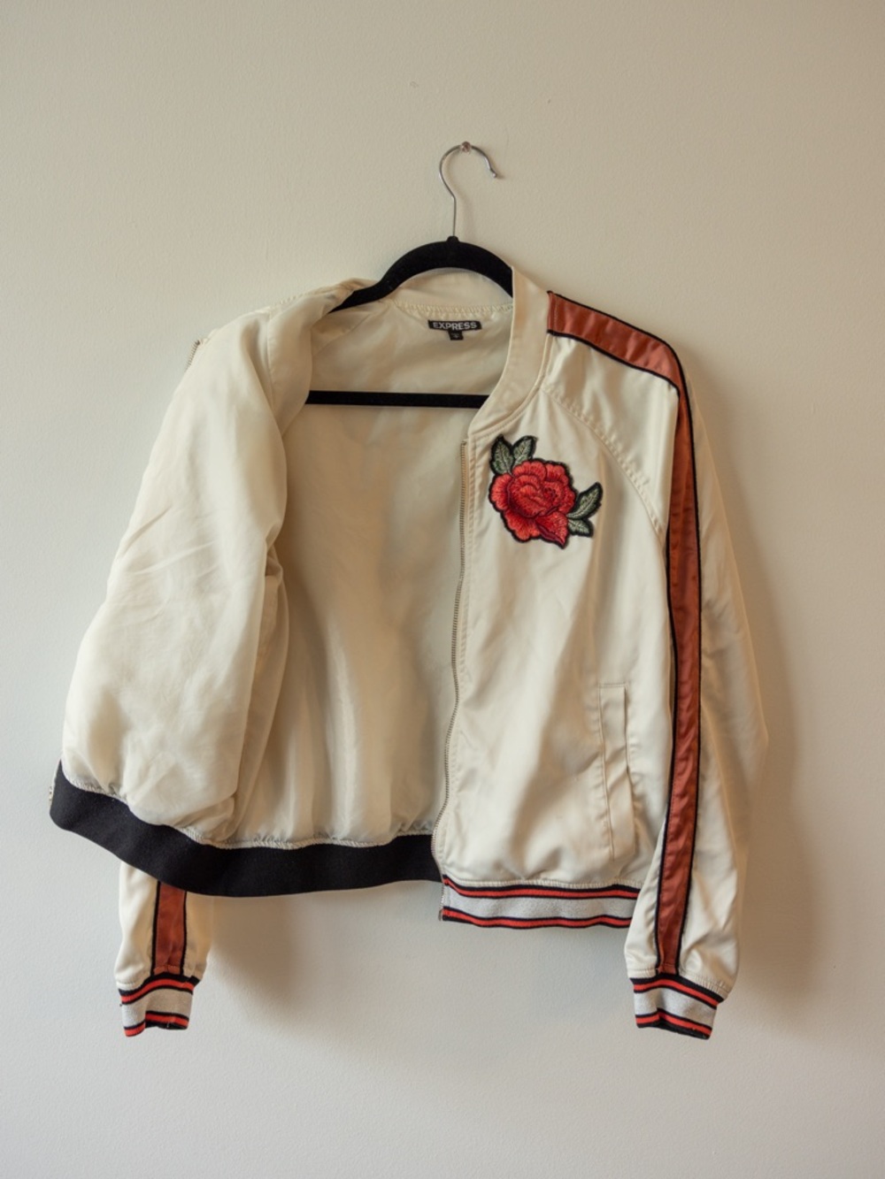 Express Cream Bomber Jacket with Red Rose Patch and Rust Stripe Accents
